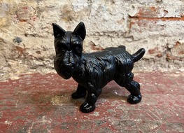 urinating dog doorstop